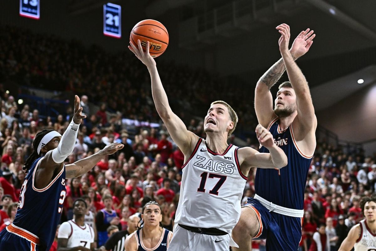 Jan 21, 2026; Spokane, Washington, USA; Gonzaga Bulldogs guard Mario Saint-Supery (17) shoots the ball against Pepperdine Waves forward Pavle Stosic (4) in the first half at McCarthey Athletic Center. Mandatory Credit: James Snook-Imagn Images