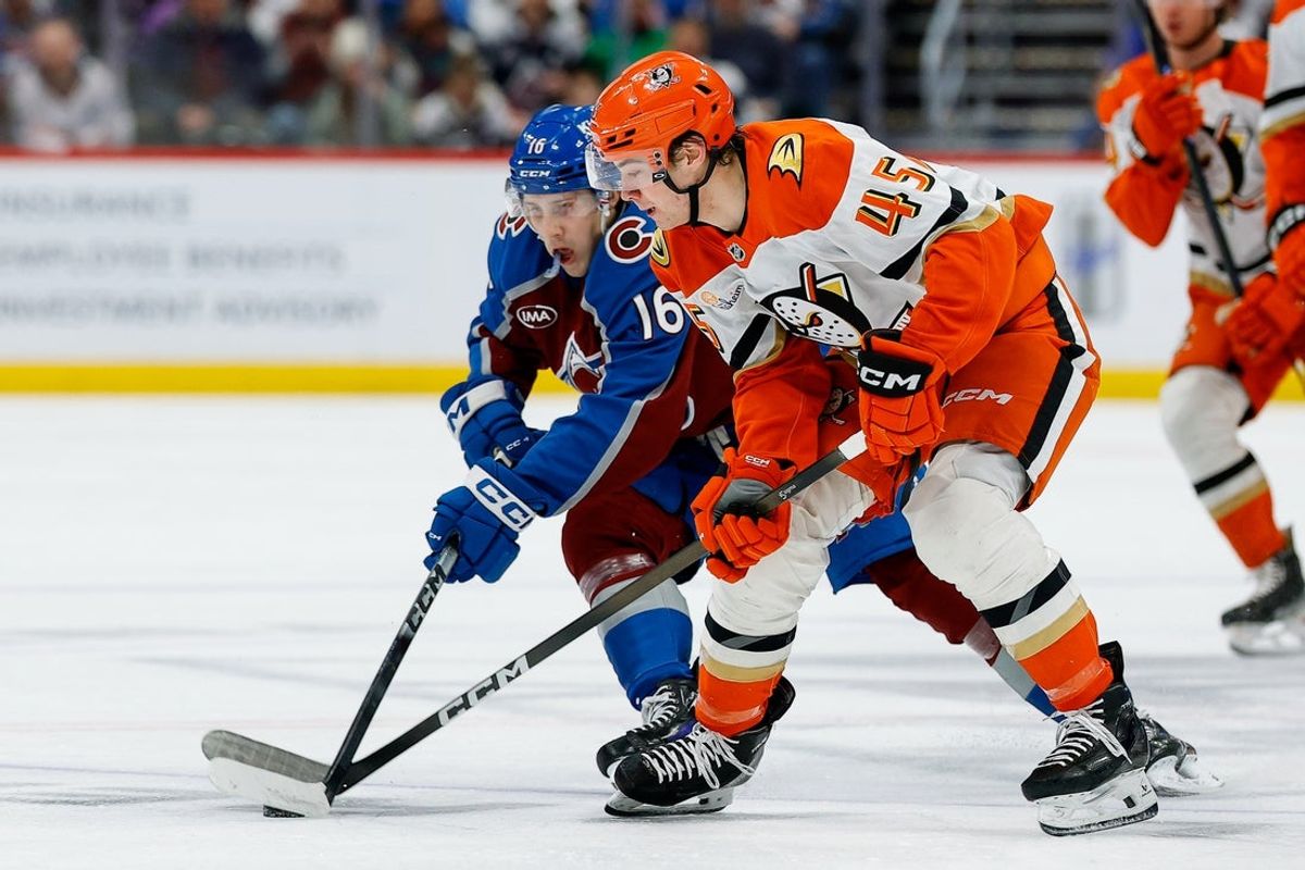 Jan 21, 2026; Denver, Colorado, USA; Anaheim Ducks right wing Beckett Sennecke (45) and Colorado Avalanche left wing Taylor Makar (16) battle for the puck in the first period at Ball Arena. Mandatory Credit: Isaiah J. Downing-Imagn Images