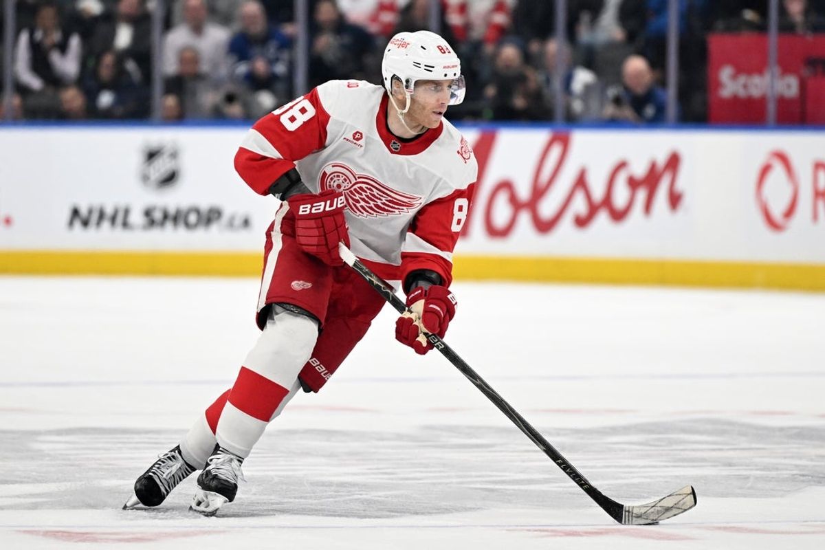 Jan 21, 2026; Toronto, Ontario, CAN;  Detroit Red Wings forward Patrick Kane (88) skates with the puck against the Toronto Maple Leafs in overtime at Scotiabank Arena. Mandatory Credit: Dan Hamilton-Imagn Images