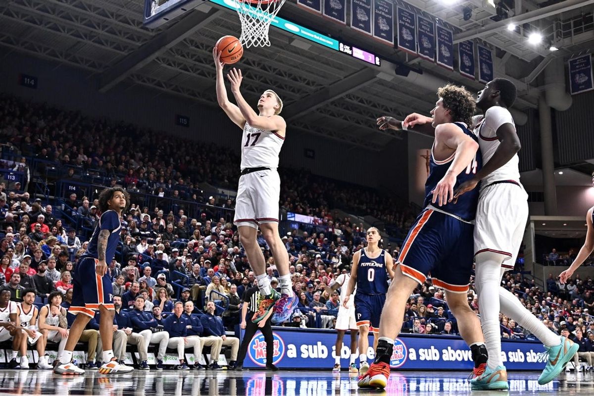 Jan 21, 2026; Spokane, Washington, USA; Gonzaga Bulldogs guard Mario Saint-Supery (17) makes a basket against the Pepperdine Waves in the second half at McCarthey Athletic Center. Mandatory Credit: James Snook-Imagn Images