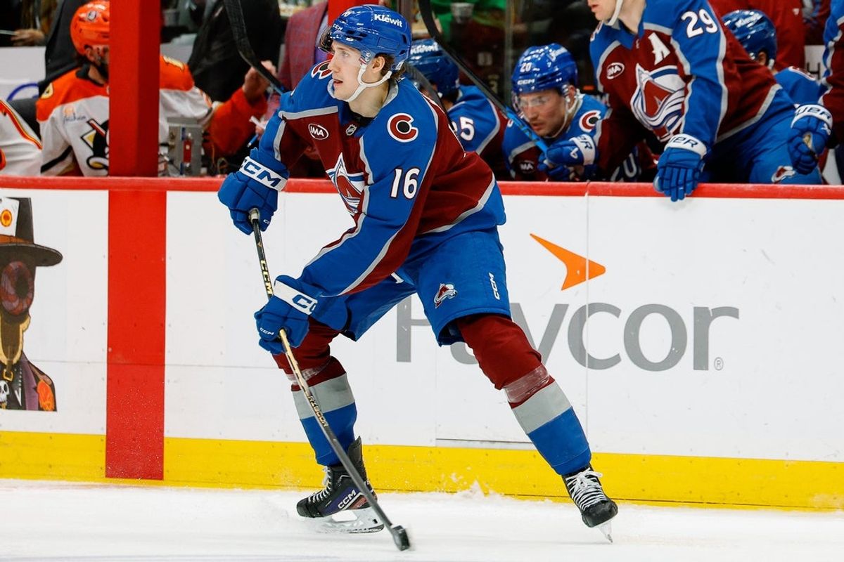 Jan 21, 2026; Denver, Colorado, USA; Colorado Avalanche left wing Taylor Makar (16) controls the puck in the third period against the Anaheim Ducks at Ball Arena. Mandatory Credit: Isaiah J. Downing-Imagn Images