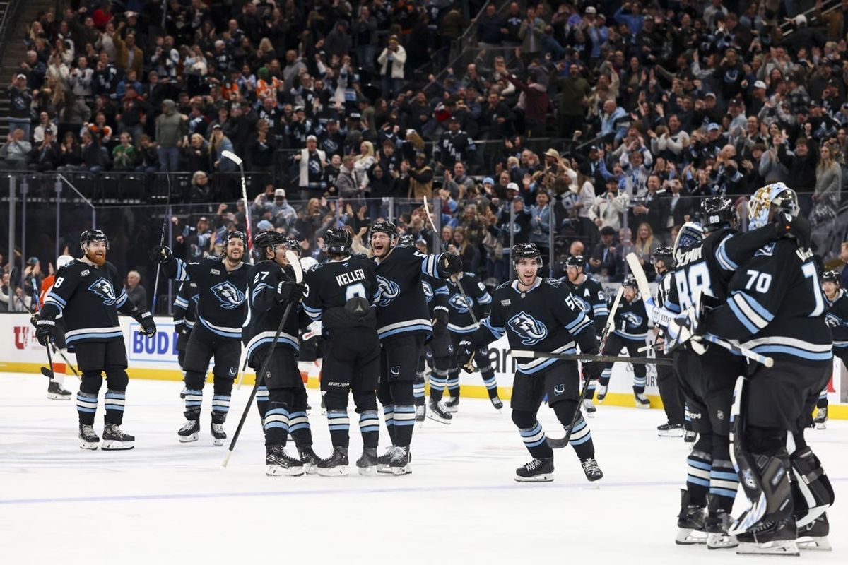 Jan 21, 2026; Salt Lake City, Utah, USA; The Utah Mammoth celebrate an overtime win against the Philadelphia Flyers at Delta Center. Mandatory Credit: Rob Gray-Imagn Images