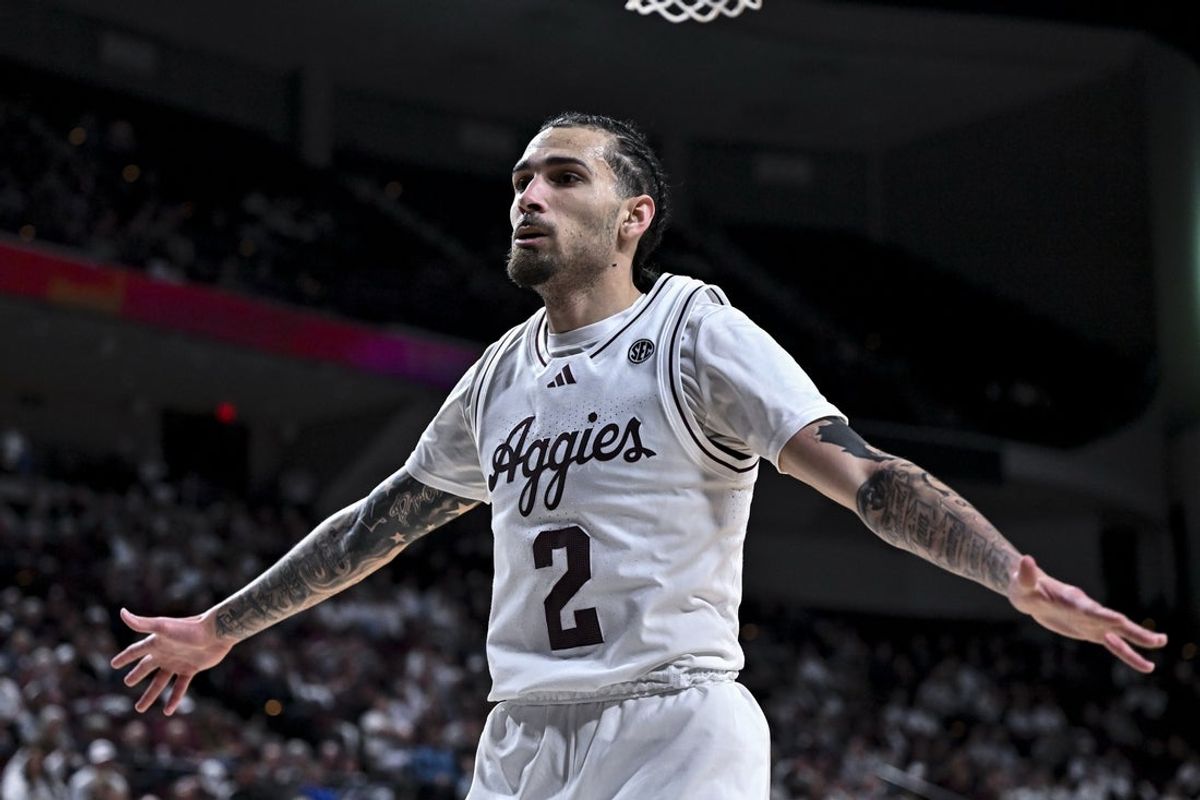 Jan 21, 2026; College Station, Texas, USA; Texas A&M Aggies guard Pop Isaacs (2) defends during the first half against the Mississippi State Bulldogs at Reed Arena. Mandatory Credit: Maria Lysaker-Imagn Images