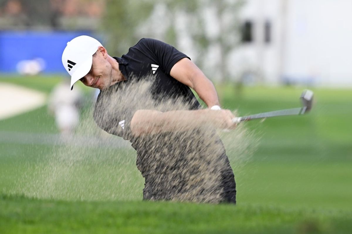 Jan 22, 2026; La Quinta, California, USA; Ludvig Aberg hits out of the bunker on the second hold during the first round of The American Express golf tournament at La Quinta Country Club. Mandatory Credit: Denis Poroy-Imagn Images