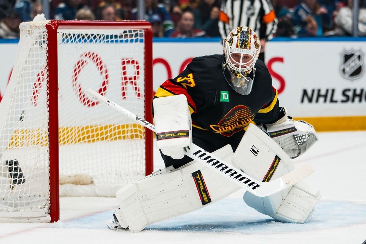 Jan 19, 2026; Vancouver, British Columbia, CAN; Vancouver Canucks goalie Kevin Lankinen (32) in the net against the New York Islanders in the first period at Rogers Arena. Mandatory Credit: Bob Frid-Imagn Images