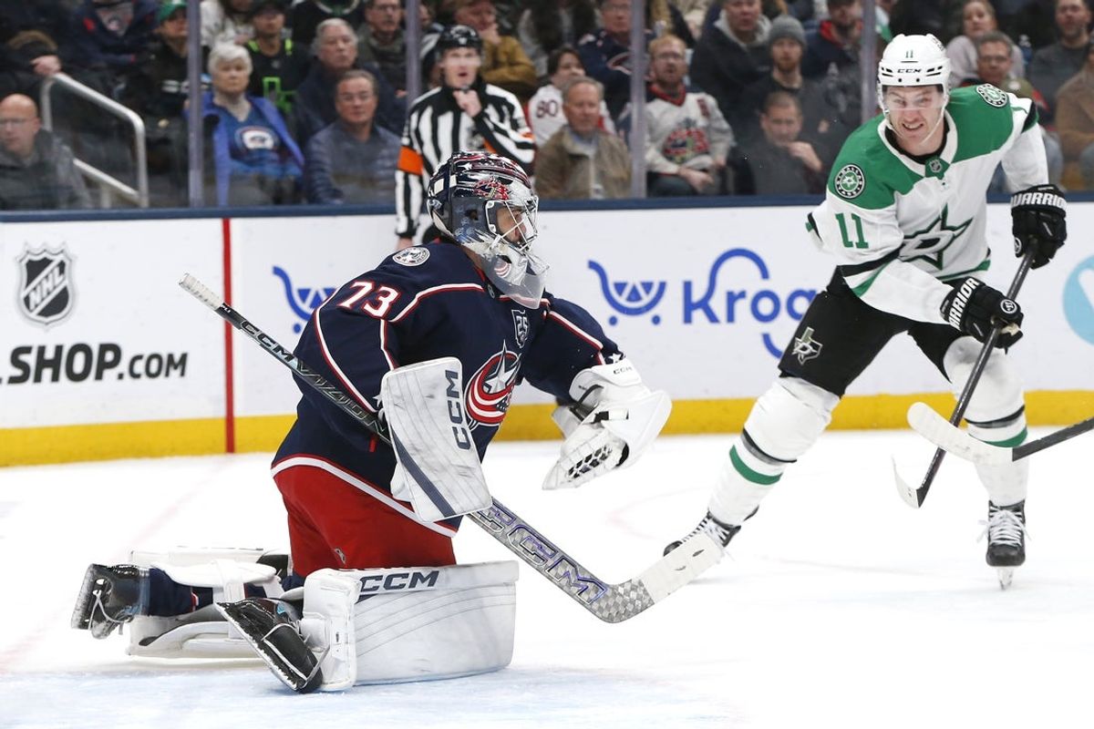Jan 22, 2026; Columbus, Ohio, USA; Dallas Stars right wing Nathan Bastian (11) looks for a rebound off Columbus Blue Jackets goalie Jet Greaves (73) save during the first period at Nationwide Arena. Mandatory Credit: Russell LaBounty-Imagn Images