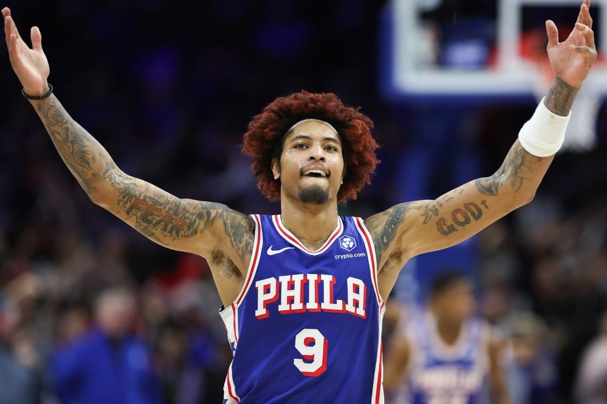 Jan 22, 2026; Philadelphia, Pennsylvania, USA; Philadelphia 76ers guard Kelly Oubre Jr. (9) celebrates after an overtime win against the Houston Rockets at Xfinity Mobile Arena. Mandatory Credit: Bill Streicher-Imagn Images