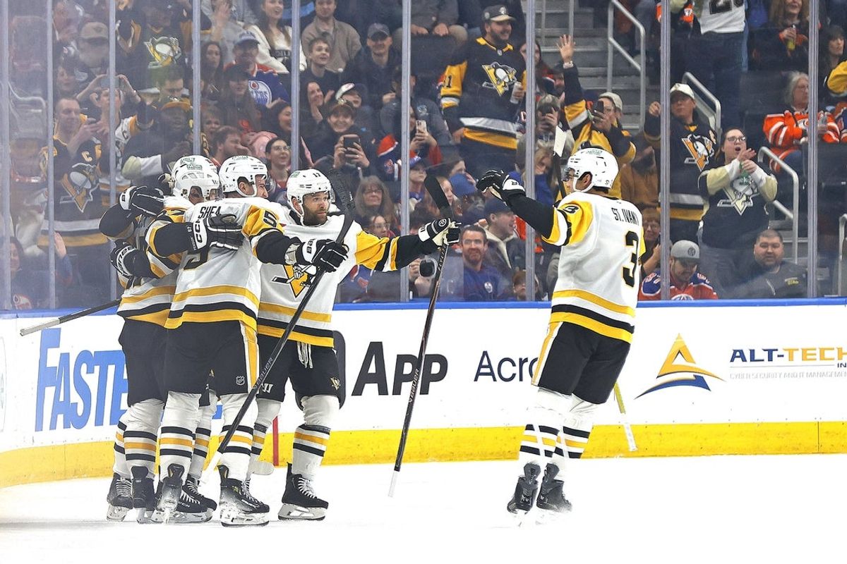 Jan 22, 2026; Edmonton, Alberta, CAN; The Pittsburgh Penguins celebrate a goal scored by forward Sidney Crosby (87) during the first period against the Edmonton Oilers at Rogers Place. Mandatory Credit: Perry Nelson-Imagn Images