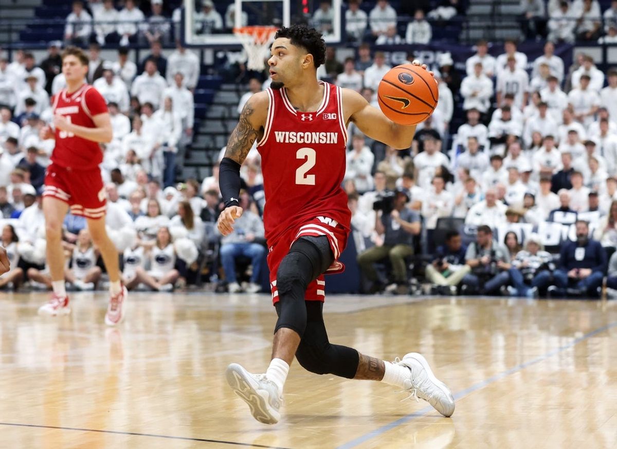 Jan 22, 2026; University Park, Pennsylvania, USA; Wisconsin Badgers guard Nick Boyd (2) drives during the first half against the Penn State Nittany Lions at Rec Hall. Mandatory Credit: Matthew O'Haren-Imagn Images
