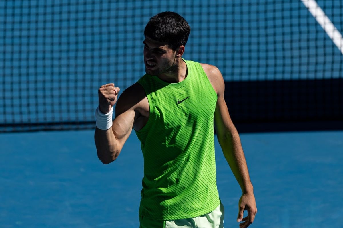 Jan 23, 2026; Melbourne, Victoria, Australia; Carlos Alcaraz of Spain in action against Corentin Moutet of France in the third round of the men’s singles at the Australian Open at Rod Laver Arena in Melbourne Park. Mandatory Credit: Mike Frey-Imagn Images