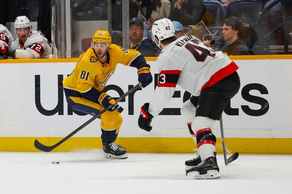 Jan 22, 2026; Nashville, Tennessee, USA;  Nashville Predators center Jonathan Marchessault (81) skates with the puck against the Ottawa Senators during the third period at Bridgestone Arena. Mandatory Credit: Steve Roberts-Imagn Images