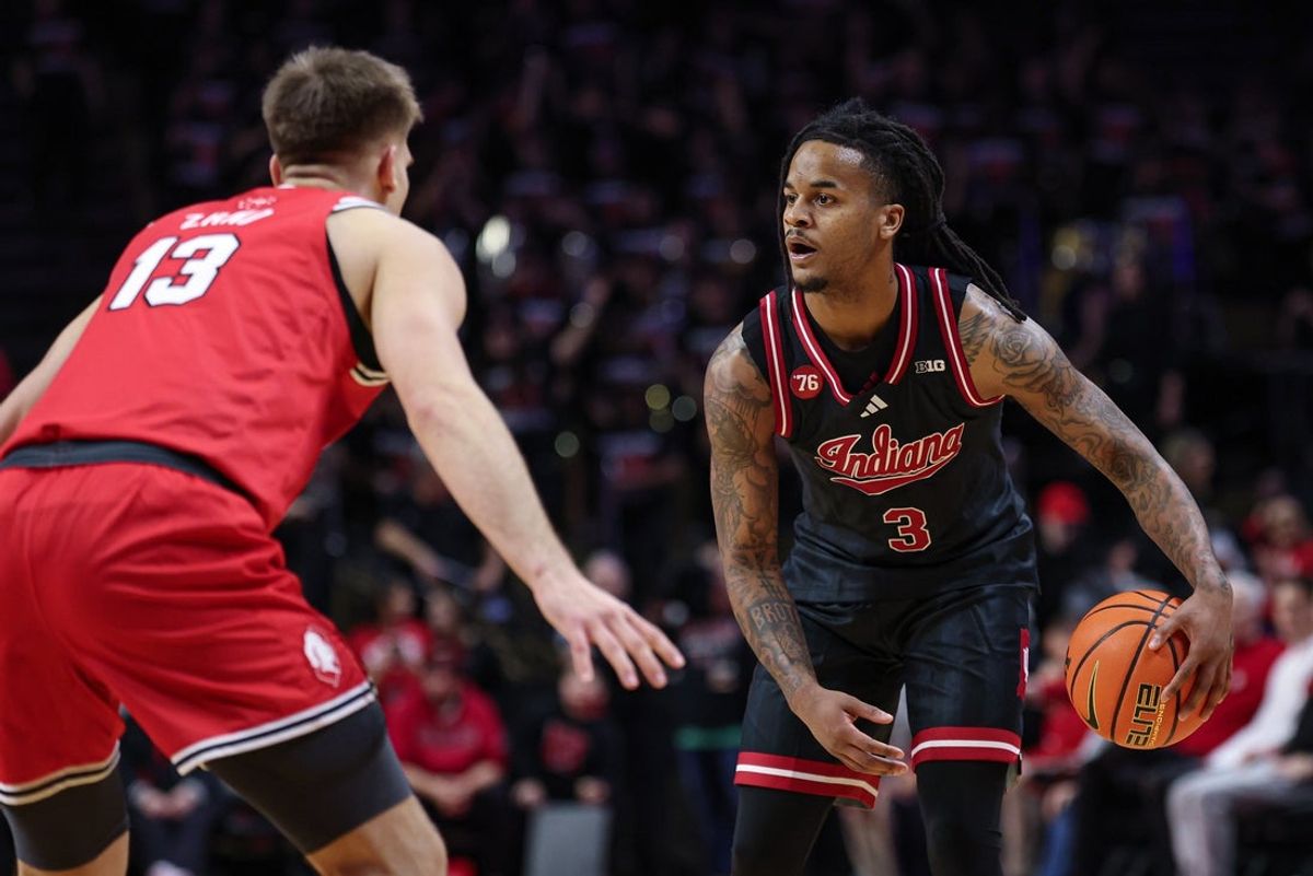Jan 23, 2026; Piscataway, New Jersey, USA; Indiana Hoosiers guard Lamar Wilkerson (3) is guarded by Rutgers Scarlet Knights guard Harun Zrno (13) during the first half at Jersey Mike's Arena. Mandatory Credit: Vincent Carchietta-Imagn Images