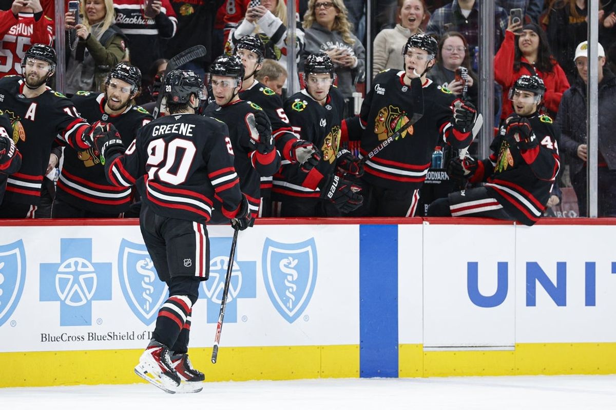 Jan 23, 2026; Chicago, Illinois, USA; Chicago Blackhawks center Ryan Greene (20) celebrates with teammates after scoring against the Tampa Bay Lightning during the first period at United Center. Mandatory Credit: Kamil Krzaczynski-Imagn Images