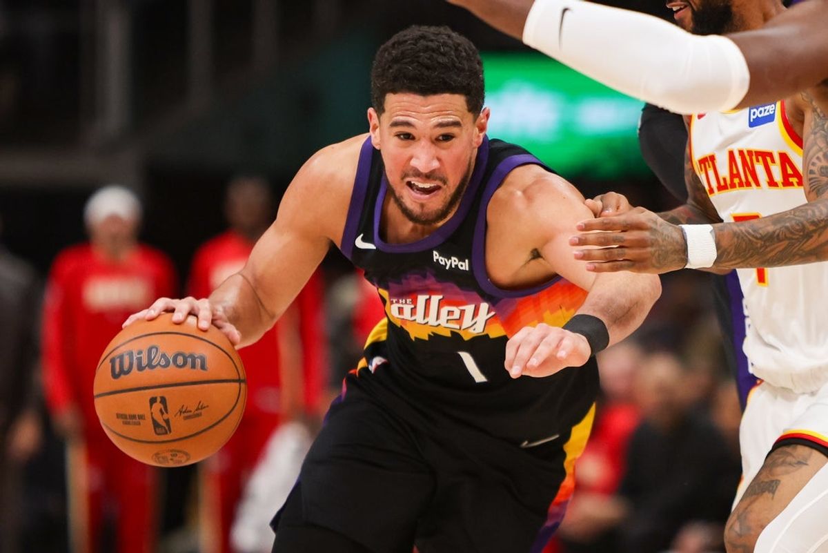 Jan 23, 2026; Atlanta, Georgia, USA; Phoenix Suns guard Devin Booker (1) drives to the basket against the Atlanta Hawks in the first quarter at State Farm Arena. Mandatory Credit: Brett Davis-Imagn Images