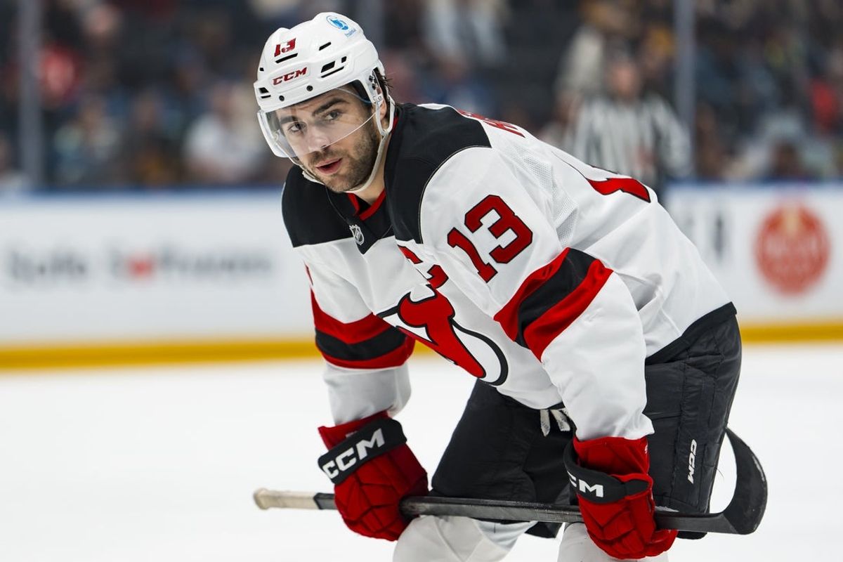 Jan 23, 2026; Vancouver, British Columbia, CAN; New Jersey Devils forward Nico Hischier (13) looks on during a stop in play against the Vancouver Canucks in the first period at Rogers Arena. Mandatory Credit: Bob Frid-Imagn Images