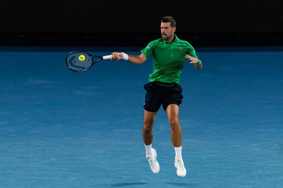 Jan 24, 2026; Melbourne, Victoria, Australia; Novak Djokovic of Serbia in action against Botic van de Zandschulp of Netherlands in the third round of the menís singles at the Australian Open at Rod Laver Arena in Melbourne Park. Mandatory Credit: Mike Frey-Imagn Images