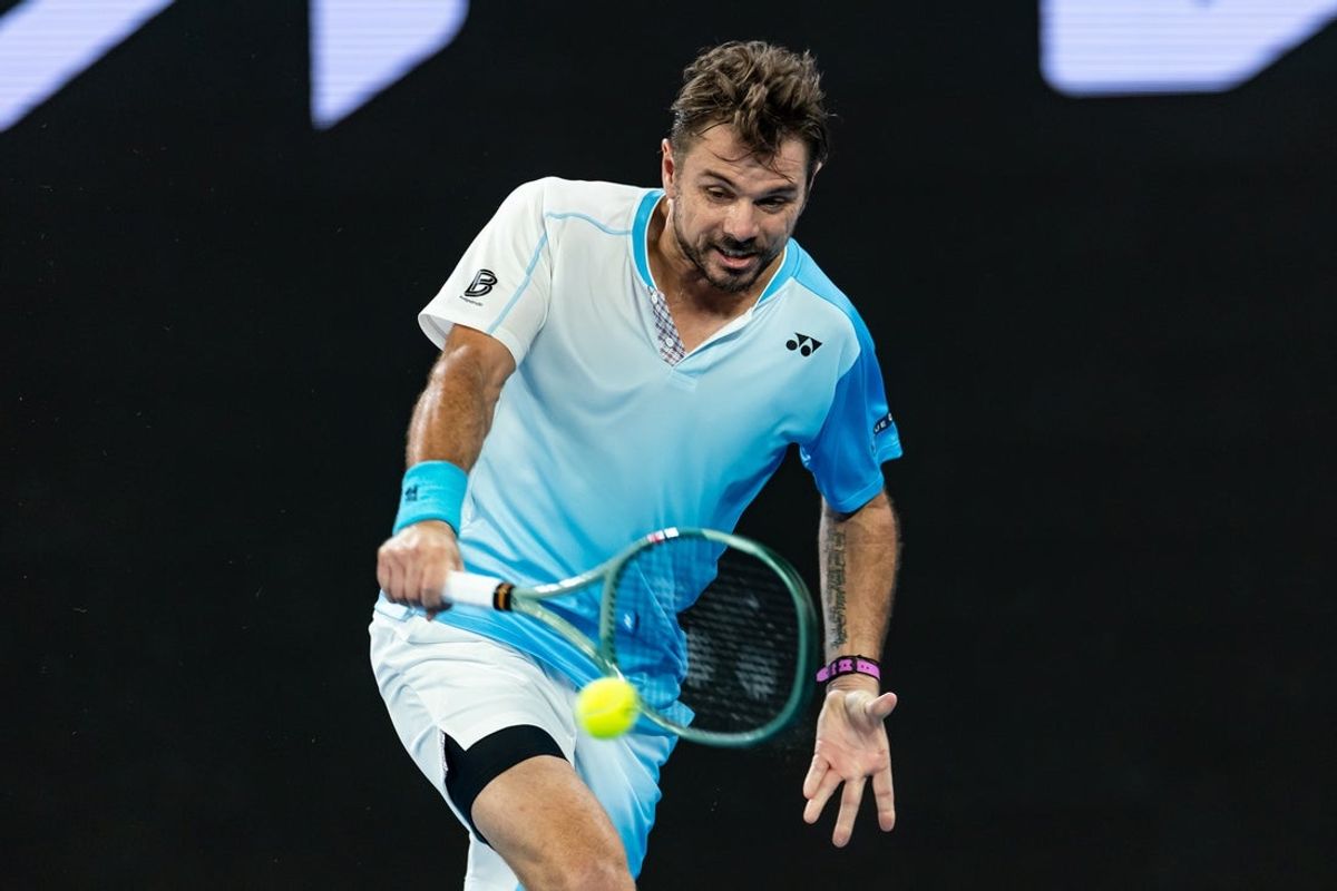 Jan 24, 2026; Melbourne, Victoria, Australia; Stan Wawrinka of Switzerland in action against Taylor Fritz of United States in the third round of the menís singles at the Australian Open at John Cain Arena in Melbourne Park. Mandatory Credit: Mike Frey-Imagn Images