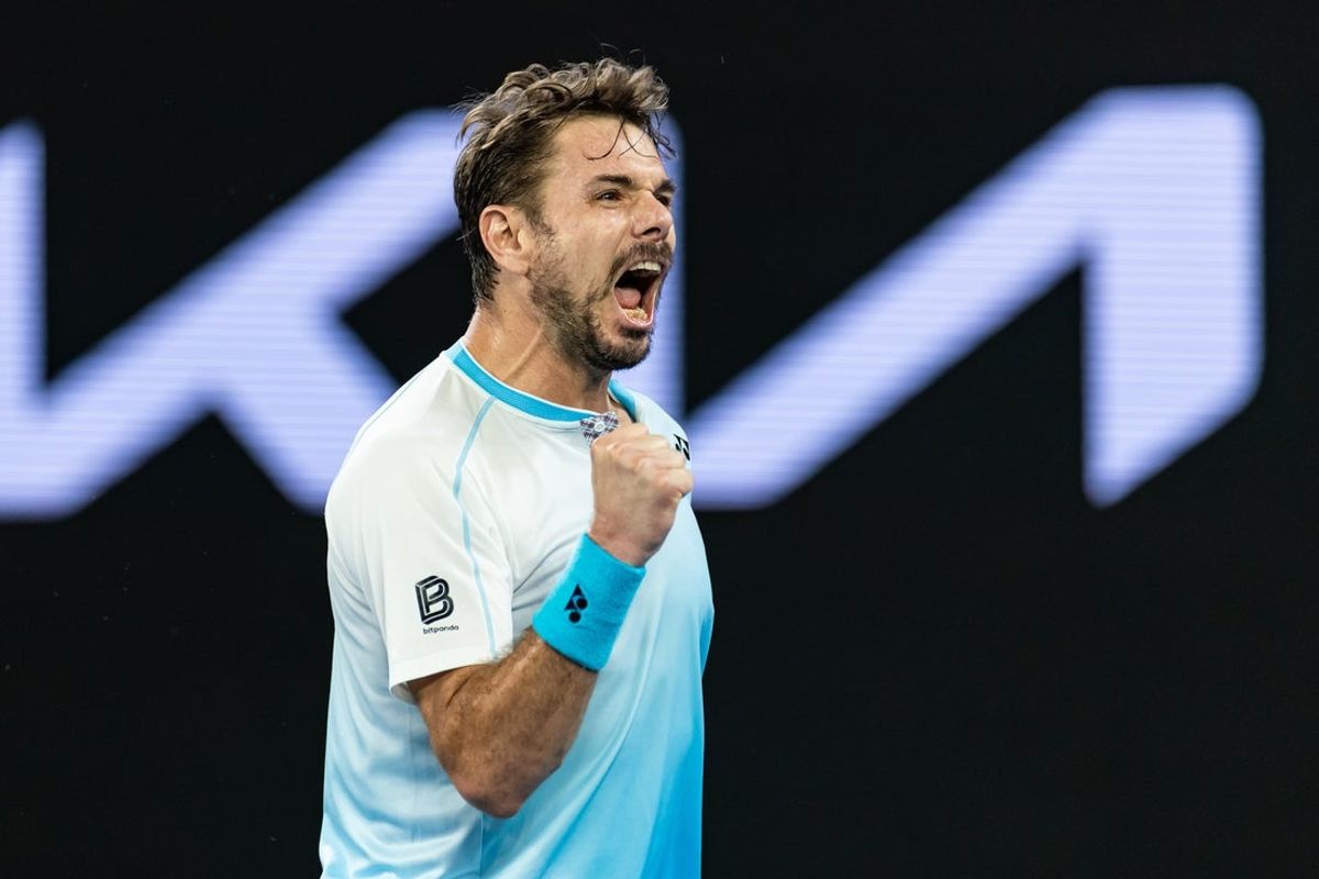 Jan 24, 2026; Melbourne, Victoria, Australia; Stan Wawrinka of Switzerland in action against Taylor Fritz of United States in the third round of the menís singles at the Australian Open at John Cain Arena in Melbourne Park. Mandatory Credit: Mike Frey-Imagn Images