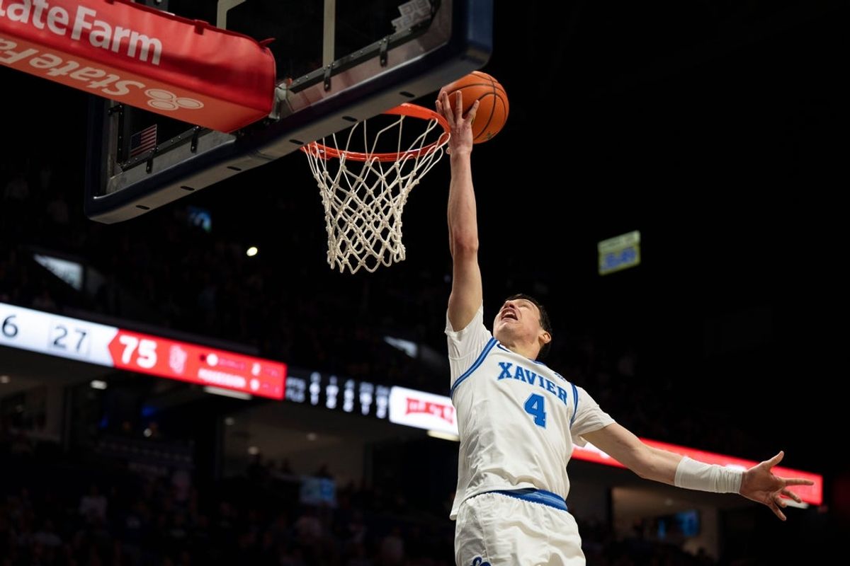 Xavier Musketeers forward Filip Borovicanin (4) hits a layup in the second half of the NCAA basketball game at the Cintas Center in Cincinnati on Saturday, Jan. 24, 2026.