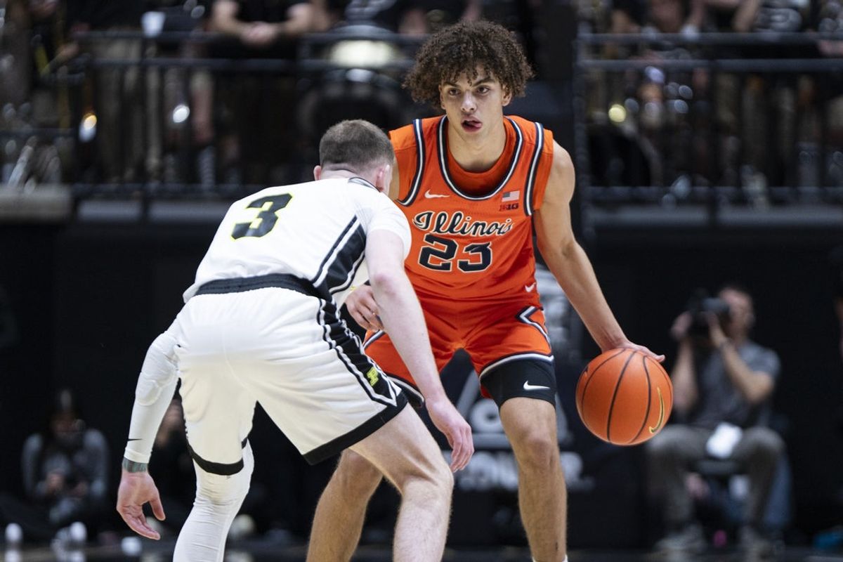 Jan 24, 2026; West Lafayette, Indiana, USA; Illinois Fighting Illini guard Keaton Wagler (23) looks to dribble around Purdue Boilermakers guard Braden Smith (3) during the first half at Mackey Arena. Mandatory Credit: Jacob Musselman-Imagn Images