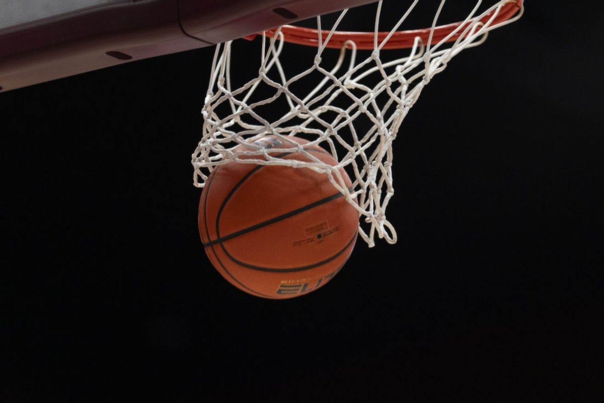 Jan 24, 2026; Stanford, California, USA;  General view of the basketball going through the hoop between the Stanford Cardinal and the California Golden Bears at Maples Pavilion. Mandatory Credit: Stan Szeto-Imagn Images