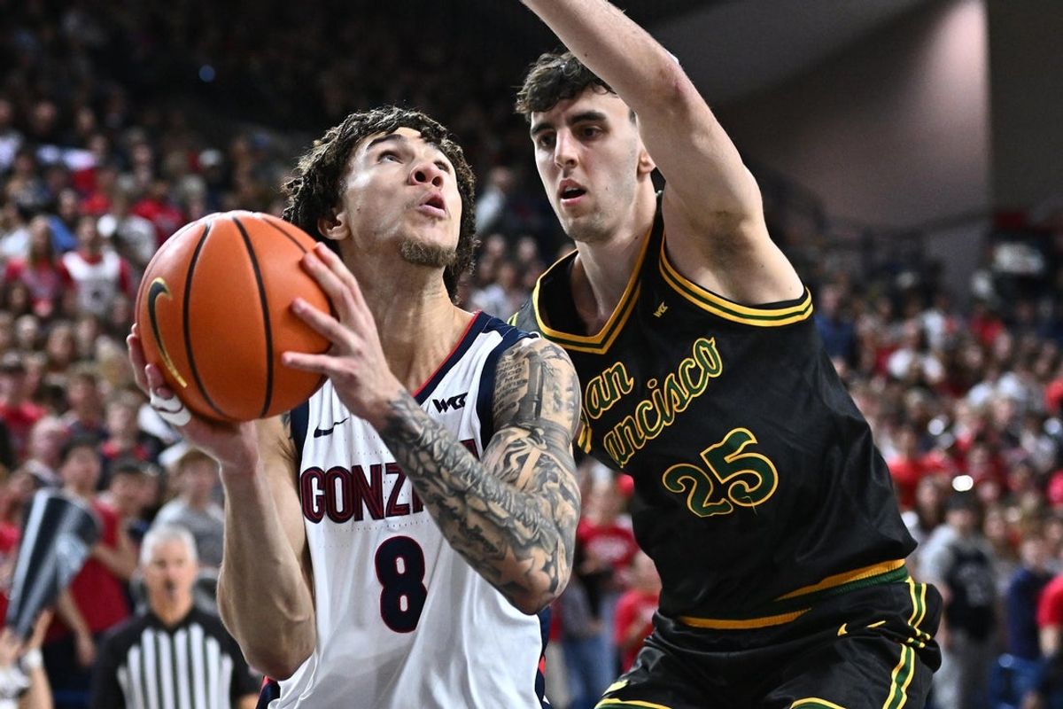 Jan 24, 2026; Spokane, Washington, USA; Gonzaga Bulldogs guard Jalen Warley (8) shoots the ball against San Francisco Dons forward Guillermo Diaz Graham (25) in the first half at McCarthey Athletic Center. Mandatory Credit: James Snook-Imagn Images