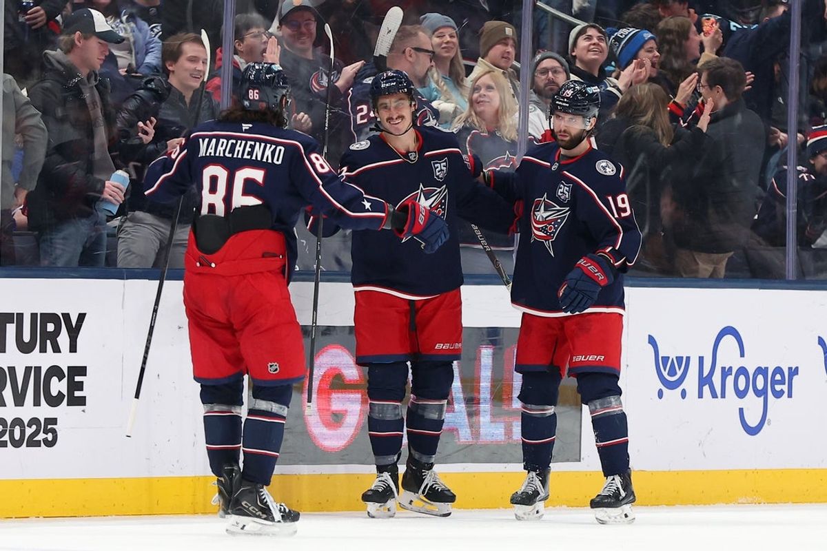 Jan 24, 2026; Columbus, Ohio, USA;  Columbus Blue Jackets left wing Mason Marchment (17) celebrates his third goal of the game with right wing Kirill Marchenko (86) and center Adam Fantilli (19) during the third period against the Tampa Bay Lightning at Nationwide Arena. Mandatory Credit: Joseph Maiorana-Imagn Images
