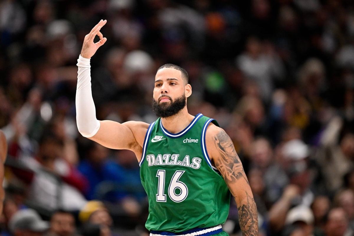 Jan 24, 2026; Dallas, Texas, USA; Dallas Mavericks forward Caleb Martin (16) celebrates after making a three point shot against the Los Angeles Lakers during the second half at the American Airlines Center. Mandatory Credit: Jerome Miron-Imagn Images