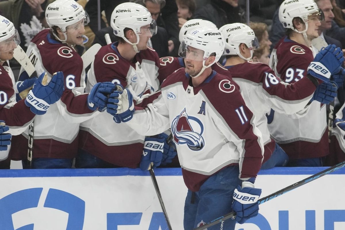 Jan 25, 2026; Toronto, Ontario, CAN; Colorado Avalanche forward Brock Nelson (11) gets congratulated after scoring his third goal of the game against the Toronto Maple Leafs during the third period at Scotiabank Arena. Mandatory Credit: John E. Sokolowski-Imagn Images
