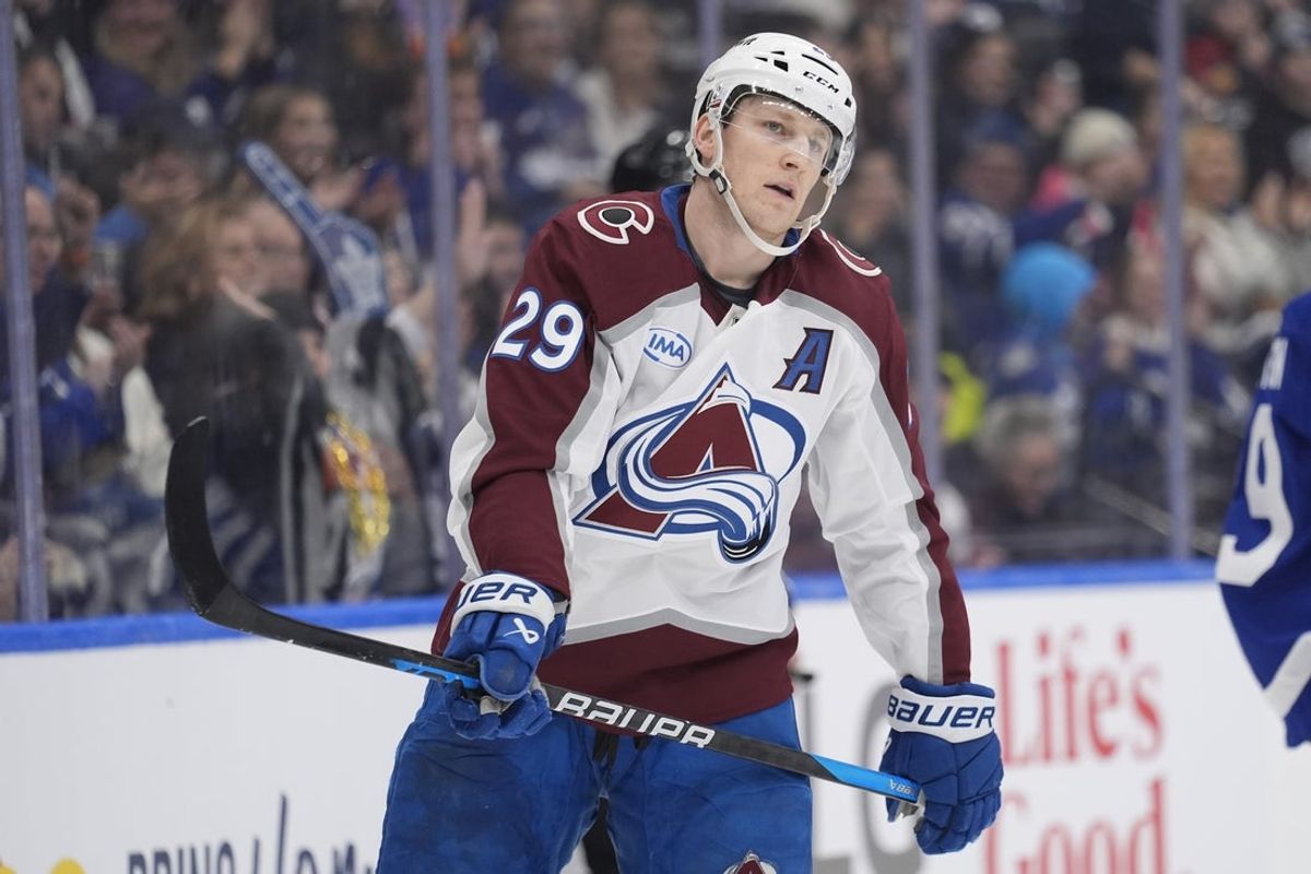 Jan 25, 2026; Toronto, Ontario, CAN; Colorado Avalanche forward Nathan MacKinnon (29) reacts after missing a scoring chance against the Toronto Maple Leafs during the second period at Scotiabank Arena. Mandatory Credit: John E. Sokolowski-Imagn Images