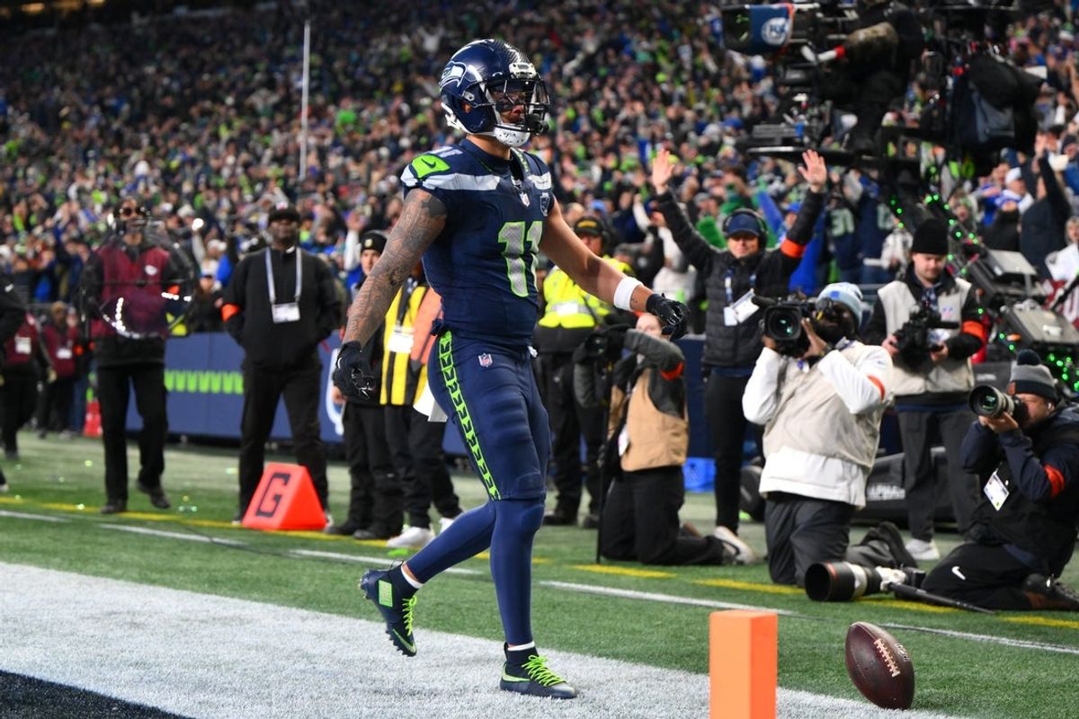 Seattle Seahawks wide receiver Jaxon Smith-Njigba (11) celebrates after scoring a touchdown against the Los Angeles Rams during the first half in the 2026 NFC Championship Game at Lumen Field. Mandatory Credit: Steven Bisig-Imagn Images