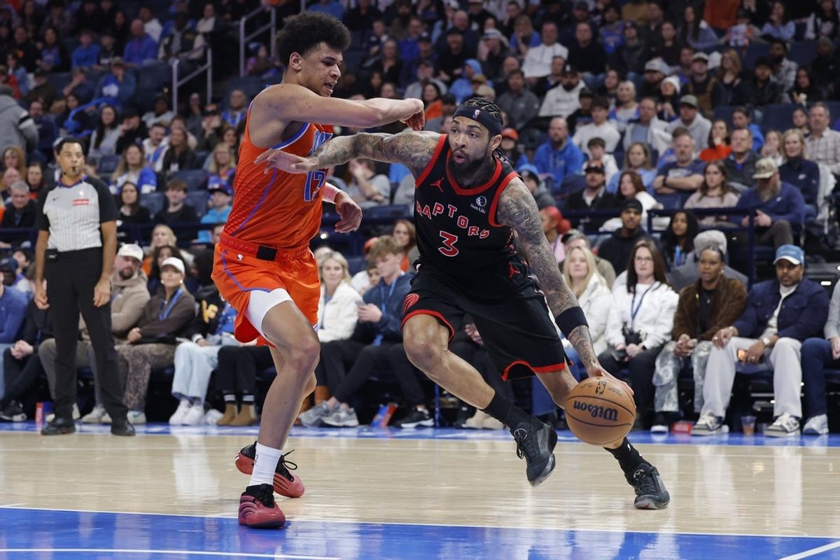 Jan 25, 2026; Oklahoma City, Oklahoma, USA;  Toronto Raptors forward Brandon Ingram (3) drives to the basket around Oklahoma City Thunder forward Ousmane Dieng (13)during the second half at Paycom Center. Mandatory Credit: Alonzo Adams-Imagn Images