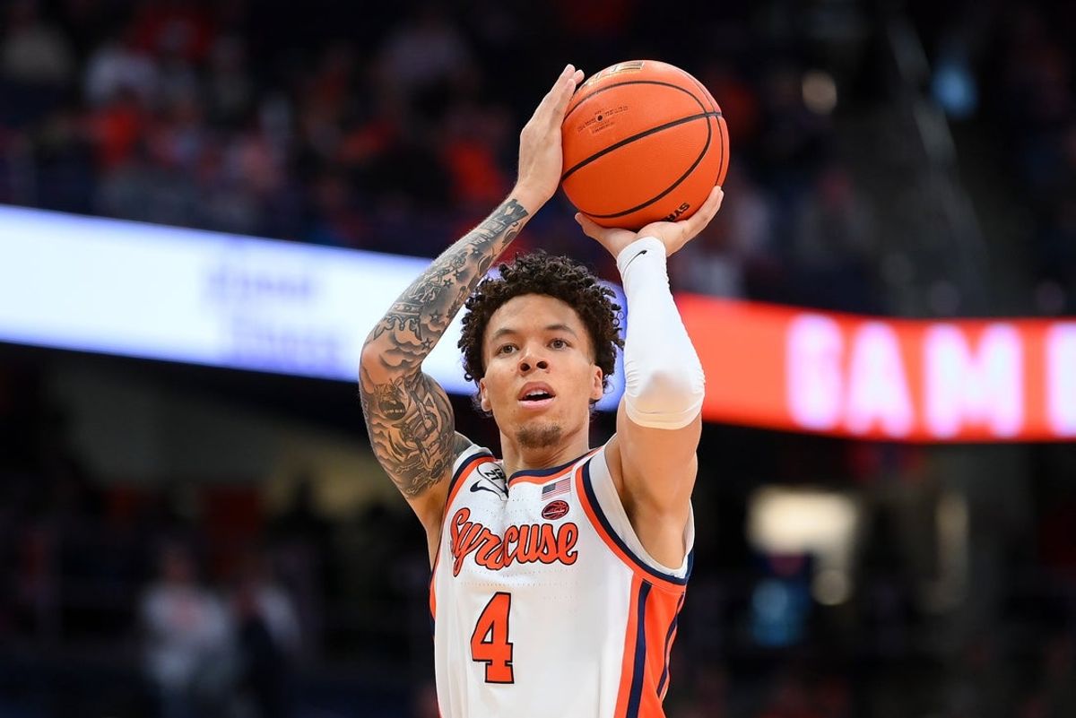 Jan 24, 2026; Syracuse, New York, USA; Syracuse Orange guard Nate Kingz (4) shoots during the second half against the Miami Hurricanes at the JMA Wireless Dome. Mandatory Credit: Rich Barnes-Imagn Images