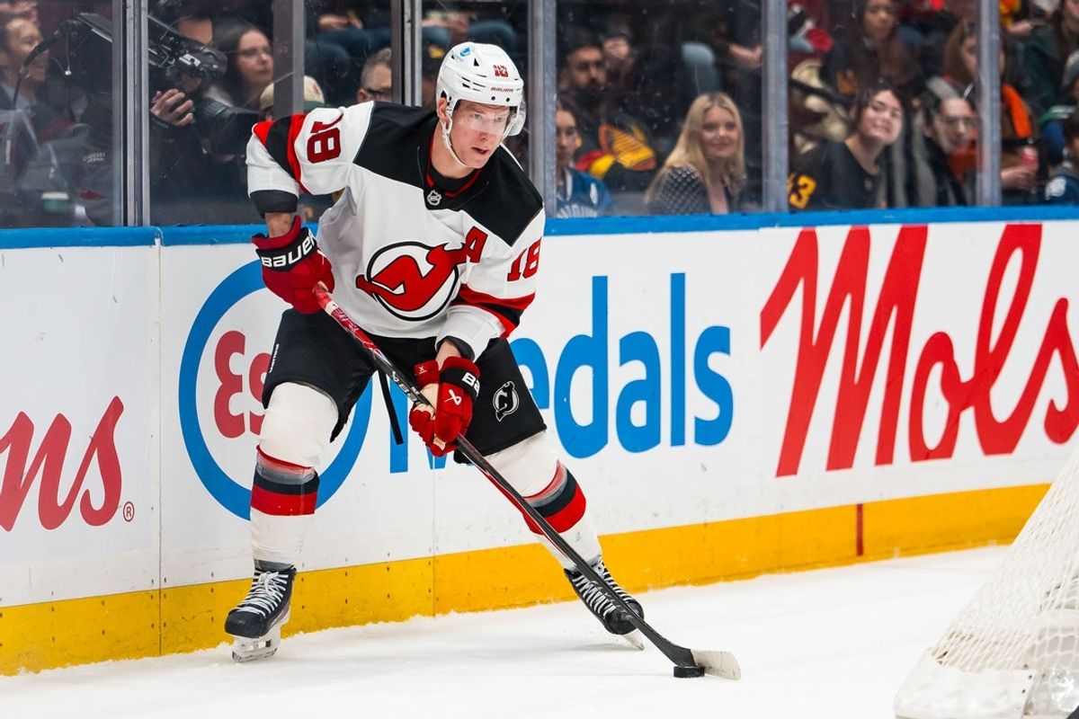 Jan 23, 2026; Vancouver, British Columbia, CAN; New Jersey Devils forward Ondrej Palat (18) handles the puck against the Vancouver Canucks in the first period at Rogers Arena. Mandatory Credit: Bob Frid-Imagn Images