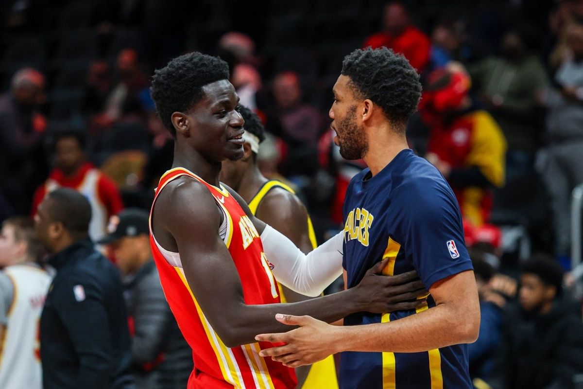 Jan 26, 2026; Atlanta, Georgia, USA; Atlanta Hawks forward Onyeka Okongwu (17) and Indiana Pacers center Tony Bradley (13) after the Atlanta Hawks victory over the Indiana Pacers at State Farm Arena. Mandatory Credit: Jordan Godfree-Imagn Images