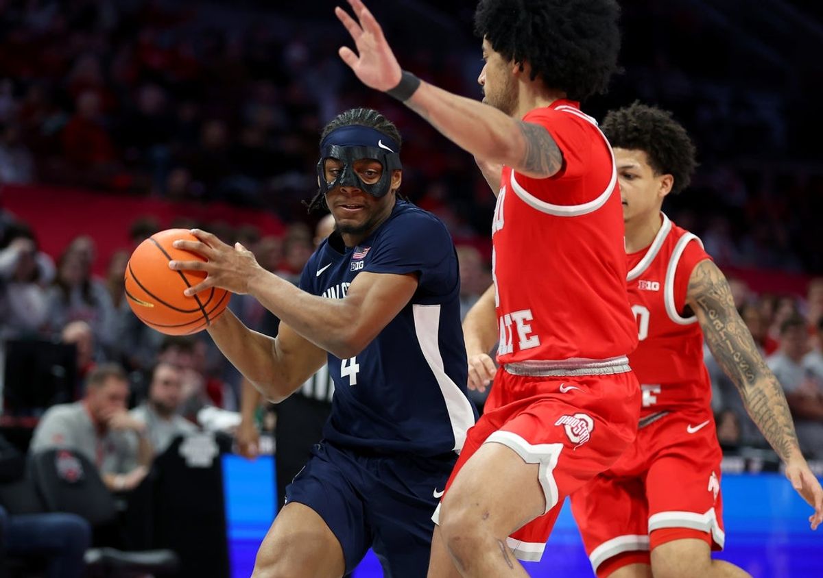 Jan 26, 2026; Columbus, Ohio, USA; Penn State Nittany Lions guard Kayden Mingo (4) looks to pass the ball as Ohio State Buckeyes guard Taison Chatman (3) defends during the first half at Value City Arena. Mandatory Credit: Joseph Maiorana-Imagn Images