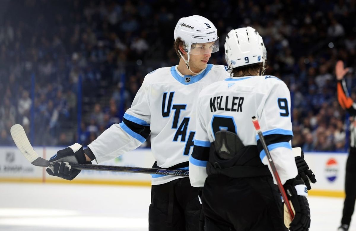 Jan 26, 2026; Tampa, Florida, USA; Utah Mammoth defenseman John Marino (6) and right wing Clayton Keller (9) talk against the Tampa Bay Lightning during the second period at Benchmark International Arena. Mandatory Credit: Kim Klement Neitzel-Imagn Images