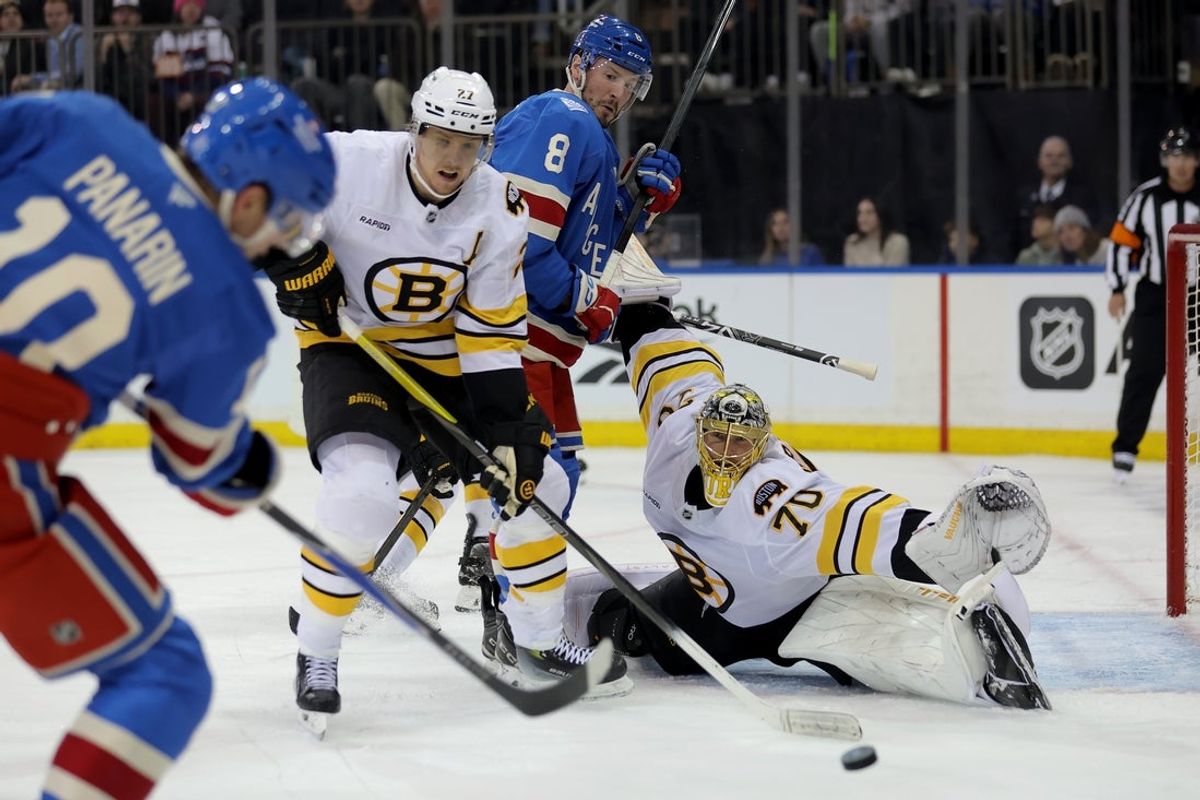 Jan 26, 2026; New York, New York, USA; Boston Bruins goaltender Joonas Korpisalo (70) makes a save on a shot by New York Rangers left wing Artemi Panarin (10) during the second period at Madison Square Garden. Mandatory Credit: Brad Penner-Imagn Images