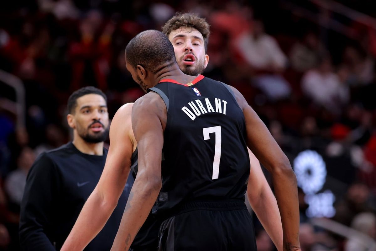 Jan 26, 2026; Houston, Texas, USA; Houston Rockets forward Kevin Durant (7) is congratulated by Houston Rockets center Alperen Sengun (28) after a made basket against the Memphis Grizzlies during the fourth quarter at Toyota Center. Mandatory Credit: Erik Williams-Imagn Images