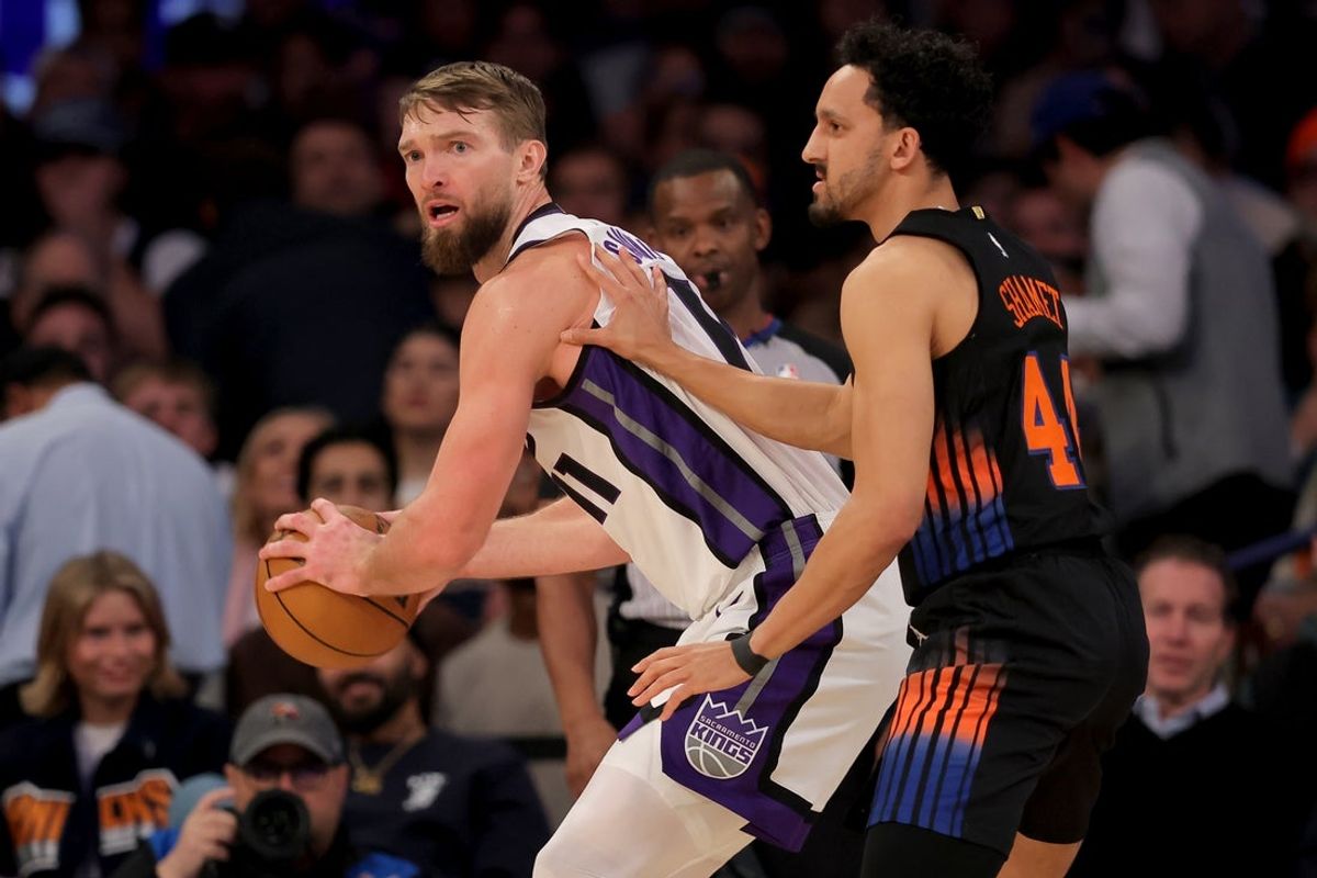 Jan 27, 2026; New York, New York, USA; Sacramento Kings forward Domantas Sabonis (11) controls the ball against New York Knicks guard Landry Shamet (44) during the first quarter at Madison Square Garden. Mandatory Credit: Brad Penner-Imagn Images