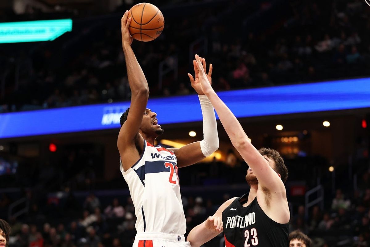 Jan 27, 2026; Washington, District of Columbia, USA; Washington Wizards center Alex Sarr (20) takes a shot over Portland Trail Blazers center Donovan Clingan (23) during the second half at Capital One Arena. Mandatory Credit: Daniel Kucin Jr.-Imagn Images