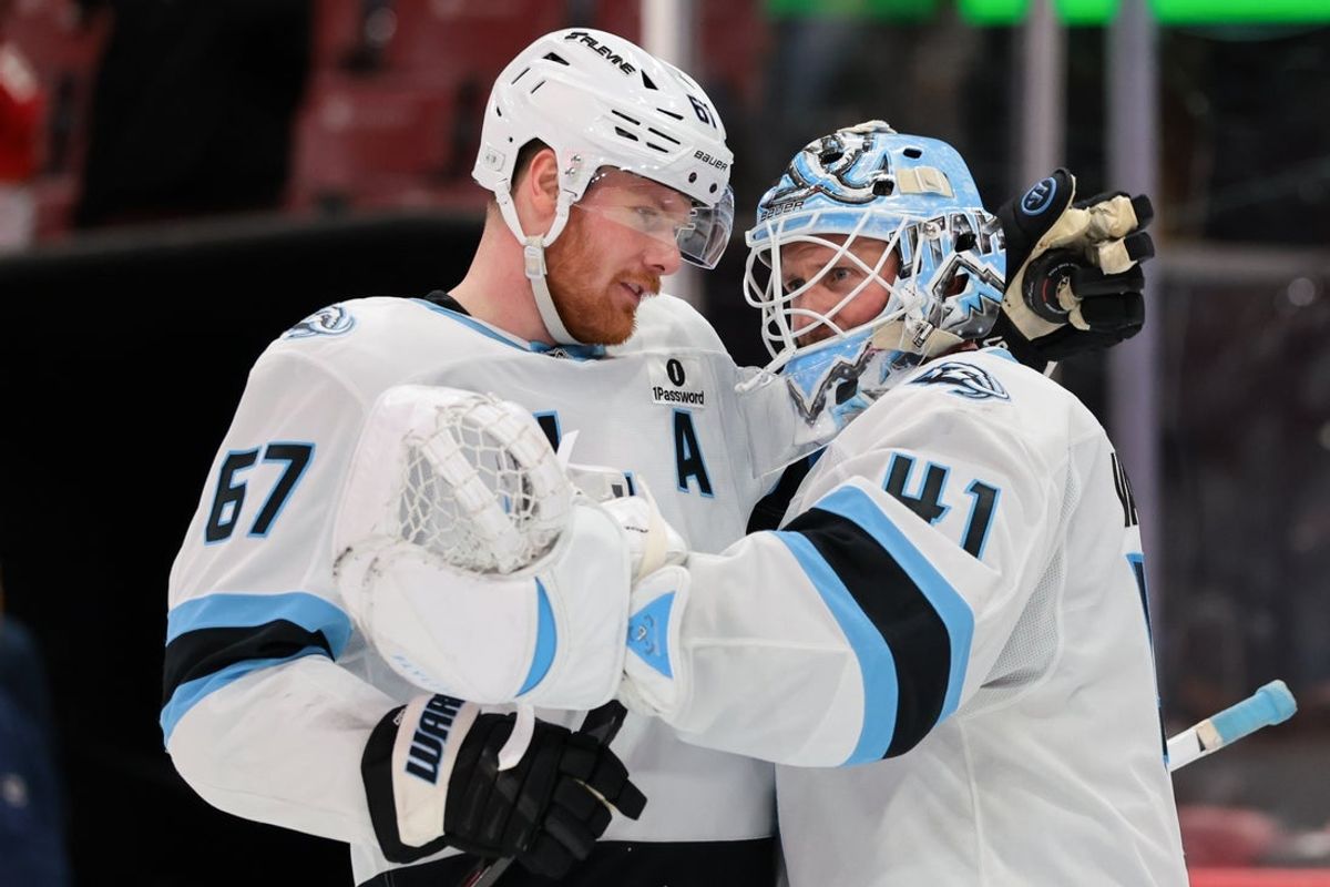 Jan 27, 2026; Sunrise, Florida, USA; Utah Mammoth left wing Lawson Crouse (67) and goaltender Vitek Vanecek (41) celebrate after the game against the Florida Panthers at Amerant Bank Arena. Mandatory Credit: Sam Navarro-Imagn Images