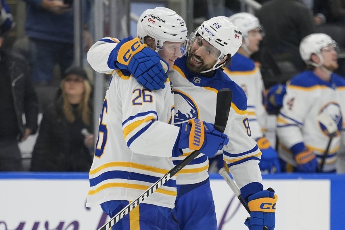 Jan 27, 2026; Toronto, Ontario, CAN; Buffalo Sabres forward Alex Tuch (89) congratulates defenseman Rasmus Dahlin (26) on his goal against the Toronto Maple Leafs during the third period at Scotiabank Arena. Mandatory Credit: John E. Sokolowski-Imagn Images