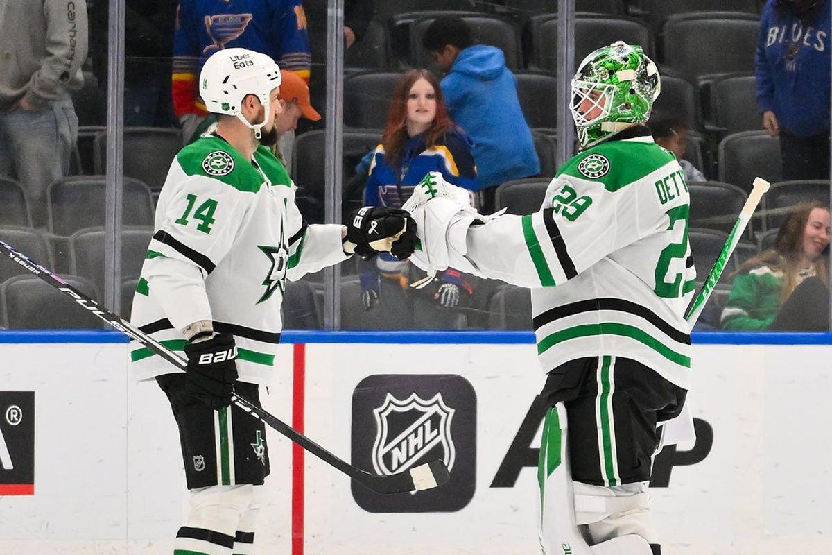 Jan 27, 2026; St. Louis, Missouri, USA; Dallas Stars goaltender Jake Oettinger (29) celebrates with left wing Jamie Benn (14) after the Stars defeated the St. Louis Blues at Enterprise Center. Mandatory Credit: Jeff Curry-Imagn Images
