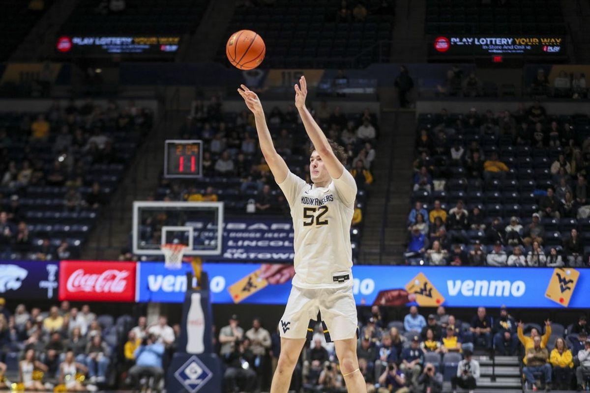 Jan 27, 2026; Morgantown, West Virginia, USA; West Virginia Mountaineers guard Treysen Eaglestaff (52) shoots during the second half against the Kansas State Wildcats at Hope Coliseum. Mandatory Credit: Ben Queen-Imagn Imagesa