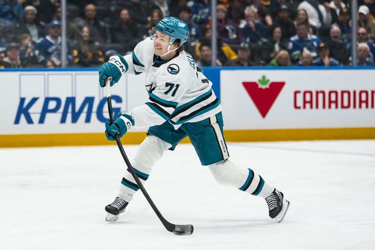 Jan 27, 2026; Vancouver, British Columbia, CAN; San Jose Sharks forward Macklin Celebrini (71) shoots against the Vancouver Canucks in the third period at Rogers Arena. Mandatory Credit: Bob Frid-Imagn Images