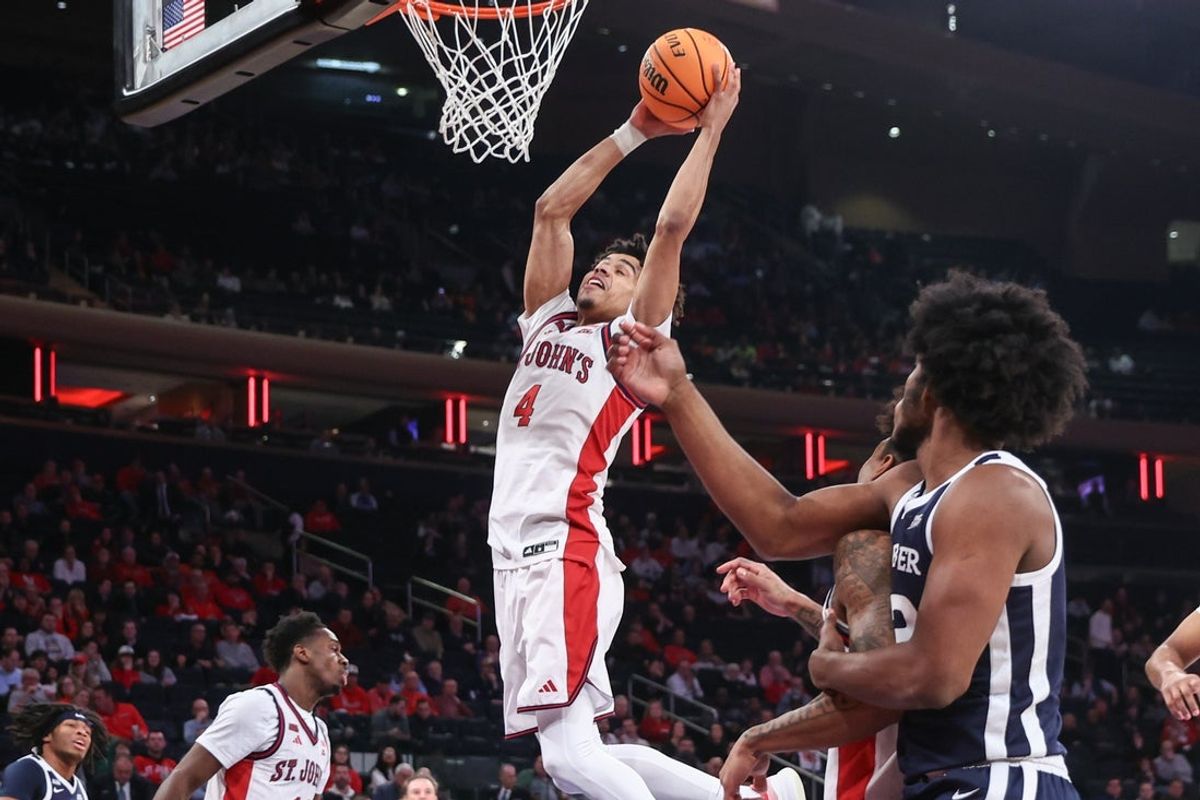 Jan 28, 2026; New York, New York, USA;  St. John's Red Storm guard Oziyah Sellers (4) grabs a rebound in the first half at Madison Square Garden. Mandatory Credit: Wendell Cruz-Imagn Images
