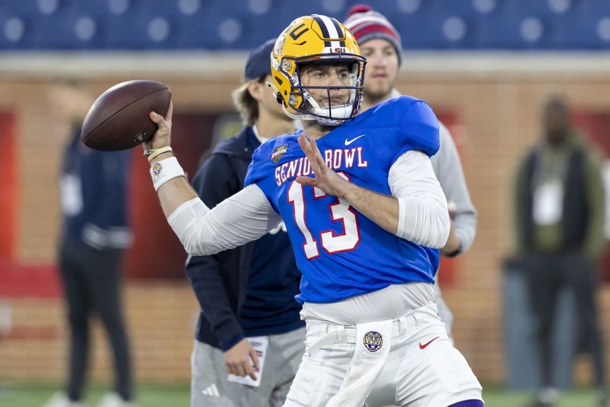 Jan 28, 2026; Mobile, AL, USA; American Team quarterback Garrett Nussmeier (13) of LSU throws the ball during American Senior Bowl practice at Hancock Whitney Stadium. Mandatory Credit: Vasha Hunt-Imagn Images