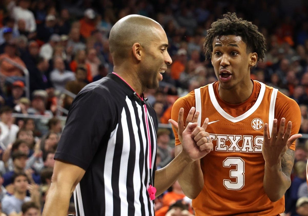 Jan 28, 2026; Auburn, Alabama, USA;  Texas Longhorns forward Dailyn Swain (3) talks with a game official after being called for a foul against the Auburn Tigers during the second half at Neville Arena. Mandatory Credit: John Reed-Imagn Images