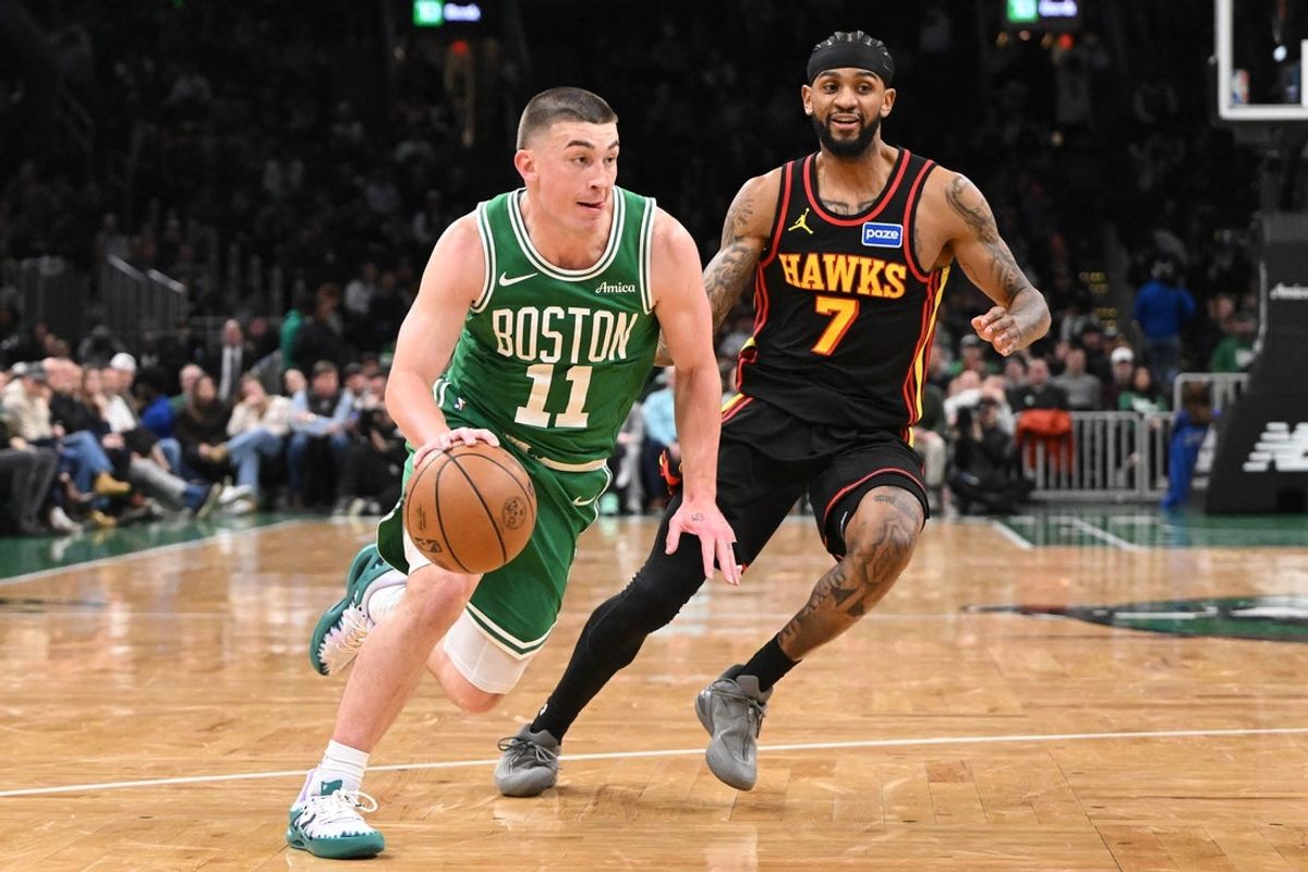 Jan 28, 2026; Boston, Massachusetts, USA; Boston Celtics guard Payton Pritchard (11) drives to the basket against the Atlanta Hawks during the second half at the TD Garden. Mandatory Credit: Brian Fluharty-Imagn Images